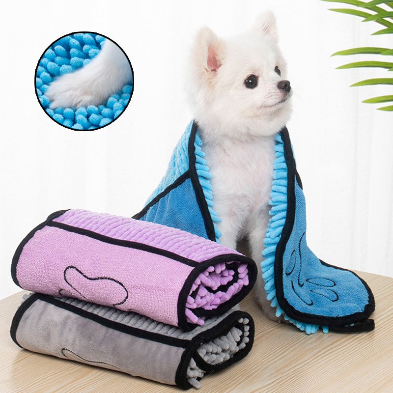 Small dog wrapped in the quick-dry robe
