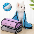 Small dog wrapped in the quick-dry robe